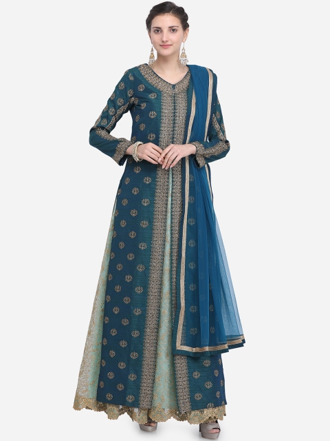 

Stylee LIFESTYLE Turquoise Blue Raw Silk Semi-Stitched Dress Material