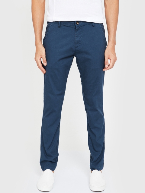 

UCLA Men Navy Blue Tapered Fit Solid Regular Trousers