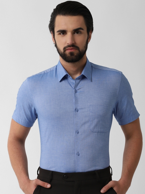 

Peter England Men Blue Slim Fit Solid Formal Shirt