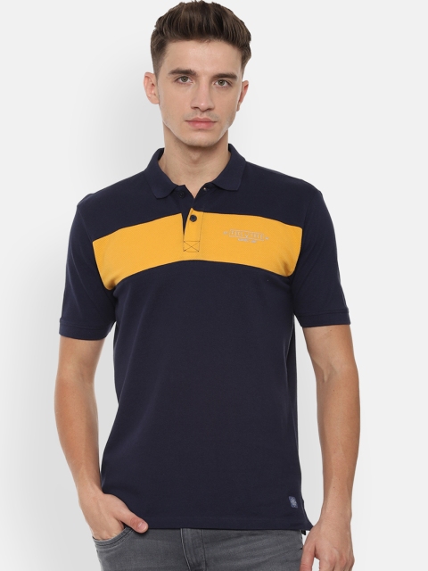 

Solly Jeans Co. Men Navy Blue & Mustard Yellow Colourblocked Polo Collar T-shirt