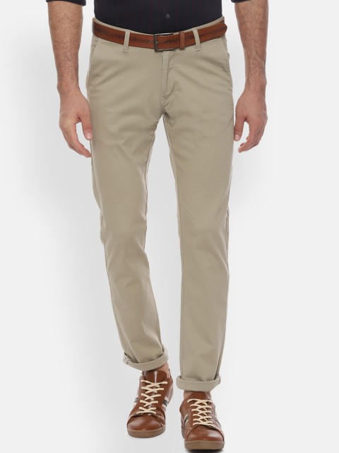 

Van Heusen Sport Men Beige Slim Fit Solid Regular Trousers