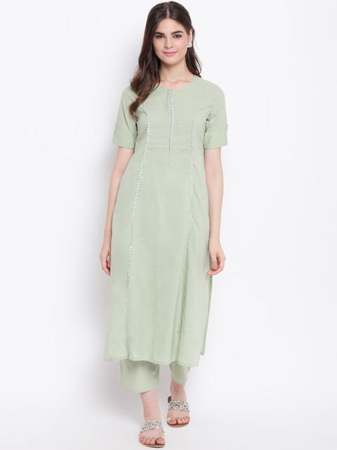 

Khushal K Women Green Solid Kurta with Trousers