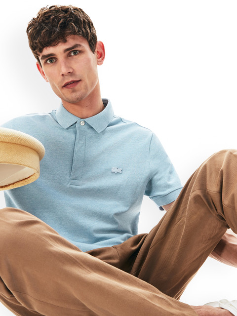 

Lacoste Men Blue Solid Polo Collar T-shirt