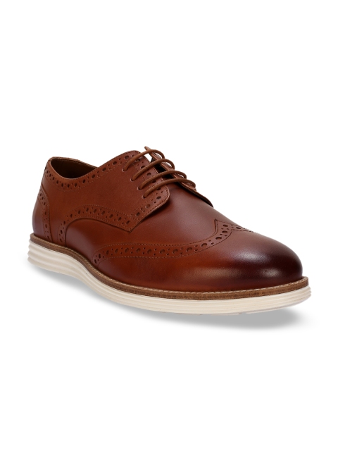 

Peter England Men Brown Solid Leather Mid-Top Brogues