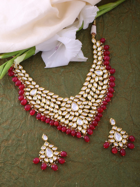 

Tistabene Women Gold-Plated White Kundan Stone-Studded & Red Beads Jewellery Set