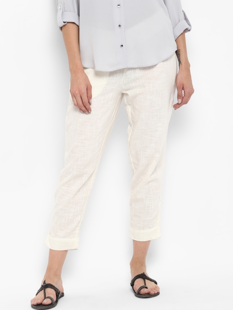 

Sringam Women Off-White Tapered Fit Self Design Peg Trousers