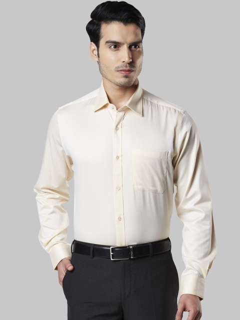 

Raymond Men Beige Regular Fit Solid Formal Shirt