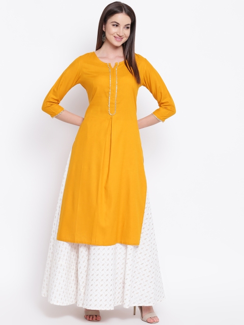 

Khushal K Women Yellow Solid Kurta with Skirt
