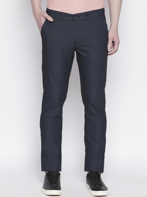

Basics Men Navy Blue Tapered Fit Self Design Regular Trousers