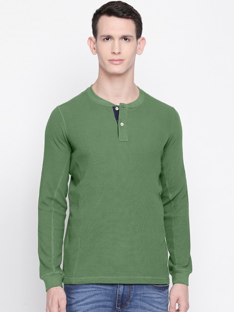 

Basics Men Green Solid Sweatshirt