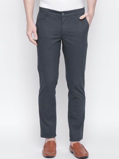 

Basics Men Navy Blue Tapered Fit Self Design Regular Trousers