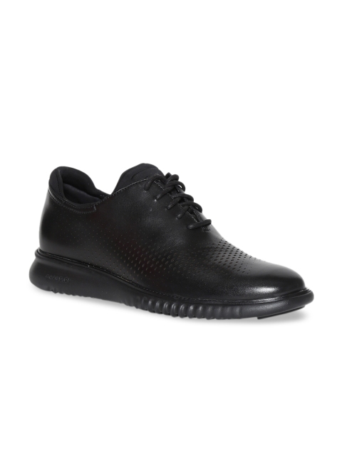 

Cole Haan Men Black Leather Sneakers