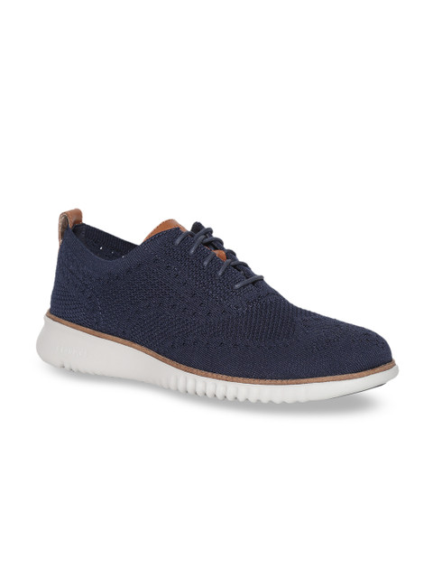 

Cole Haan Men Navy Blue Sneakers