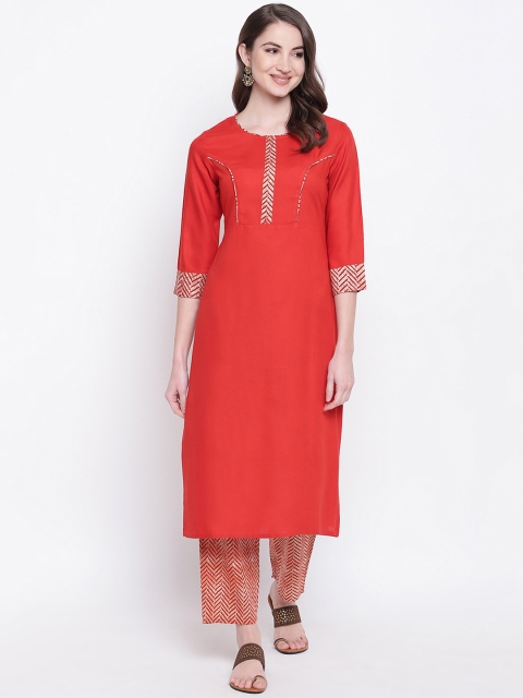 

Khushal K Women Orange & Beige Solid Kurta with Trousers