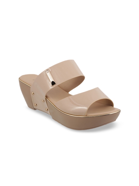 

Metro Women Beige Solid Heels