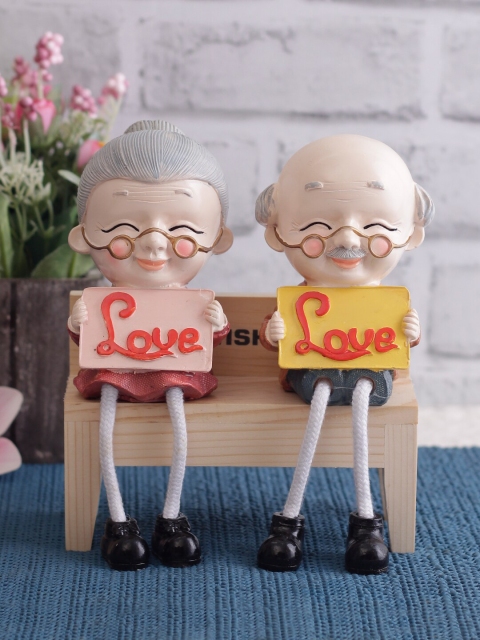 

WISHTANK Set Of 2 Multicoloured Cute Grandparent Couple With Hanging Legs Showpieces, Multi