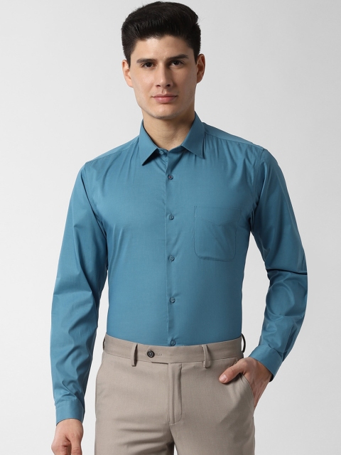 

Peter England Men Blue Slim Fit Solid Formal Shirt