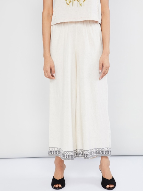 

max Women Off-White Solid Wide Leg Palazzos