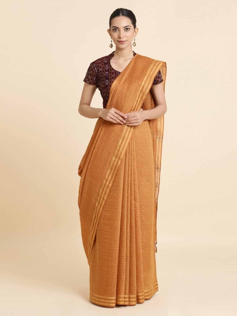 

Taneira Rust Solid Pure Tussar Saree