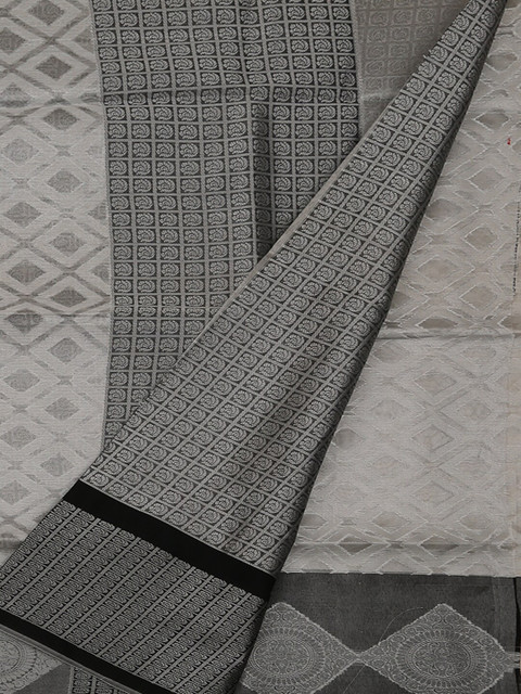 

Pothys Beige & Black Cotton Blend Woven Design Saree