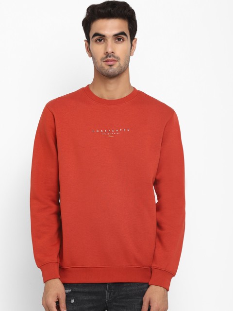 

Octave Men Rust Red Solid Sweatshirt