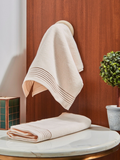 

DDecor Unisex Set Of 2 Beige Solid 500 GSM Live Beautiful Hand Towels