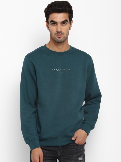 

Octave Men Teal Solid Sweatshirt