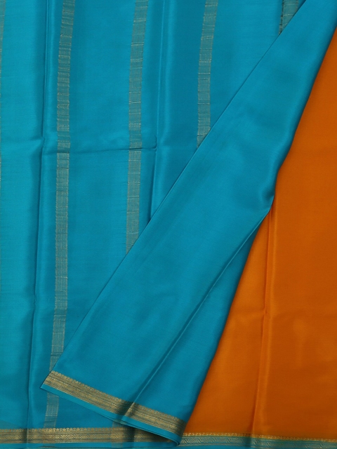 

Pothys Mustard Brown & Blue Pure Silk Solid Saree
