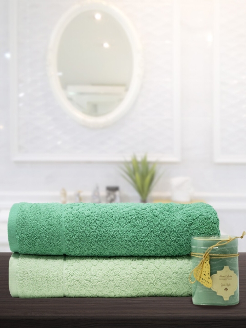 

Trident Aroma Set Of 2 Green Solid 500GSM Towels With Scented Candle