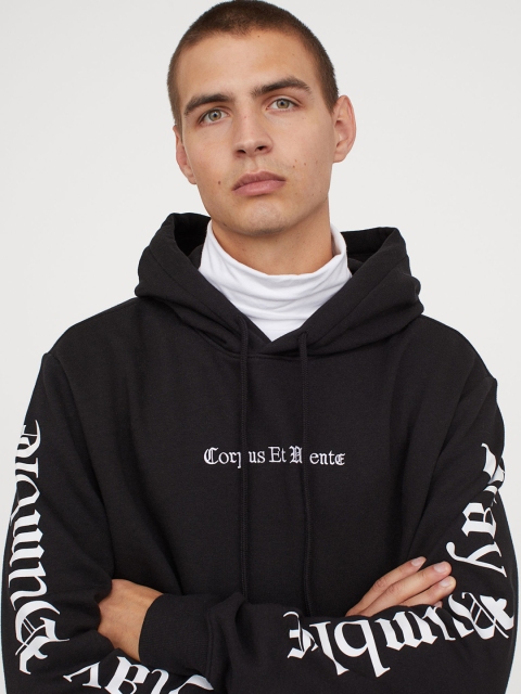 

H&M Men Black Solid Hoodie