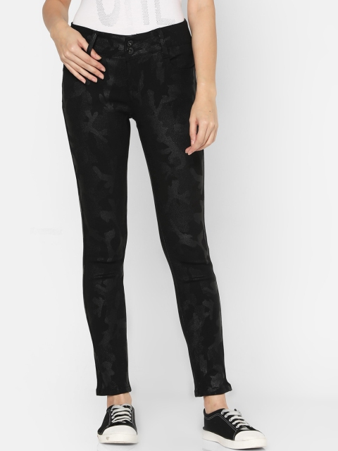 

Deal Jeans Women Black Slim Fit Printed Regular Trousers