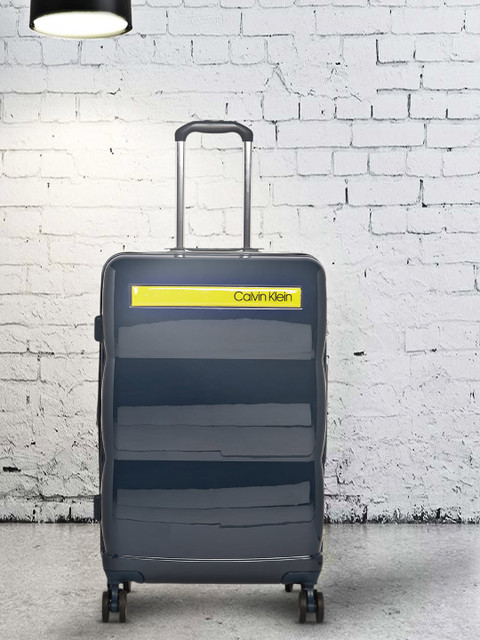 

Calvin Klein DOWN TO FLY Range Navy & Yellow Hard Medium Luggage, Navy blue