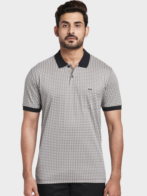 

ColorPlus Men Black & White Printed Polo Collar T-shirt