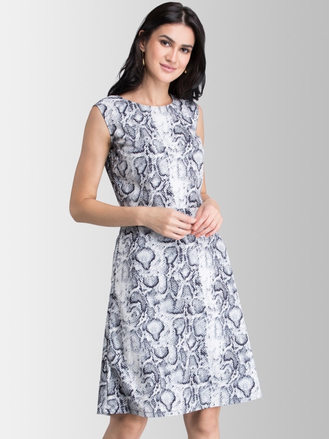 

FableStreet Women White Animal Printed Fit and Flare Dress