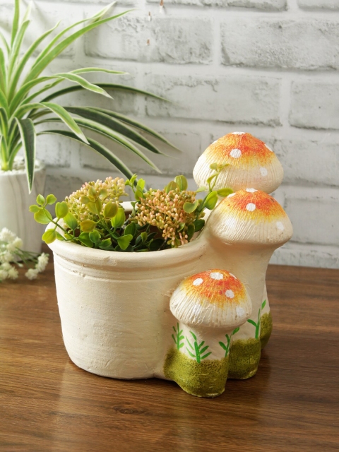 

Aapno Rajasthan Beige Handcrafted Terracotta Natural Touch Mushroom Shaped Planter
