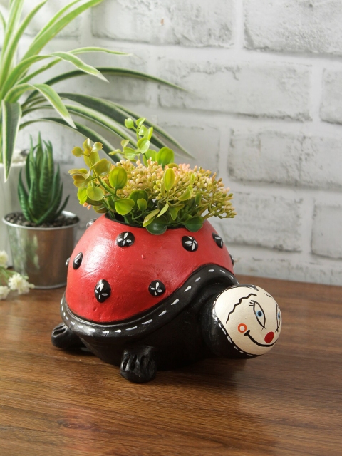 

Aapno Rajasthan Red & Black Handcrafted Terracotta Turtle Shaped Planter
