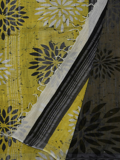 

Pothys Yellow & Black Linen Blend Printed Saree