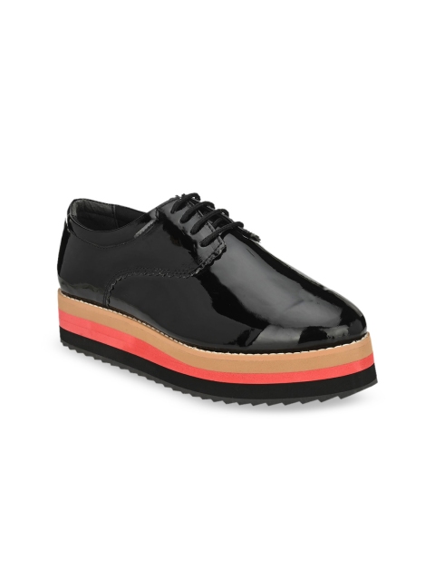 

Zebba Women Black Sneakers