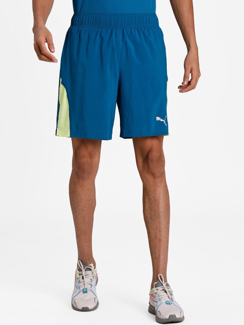 

Puma Men Blue & Fluorescent Green Colourblocked Regular Fit Sports Shorts