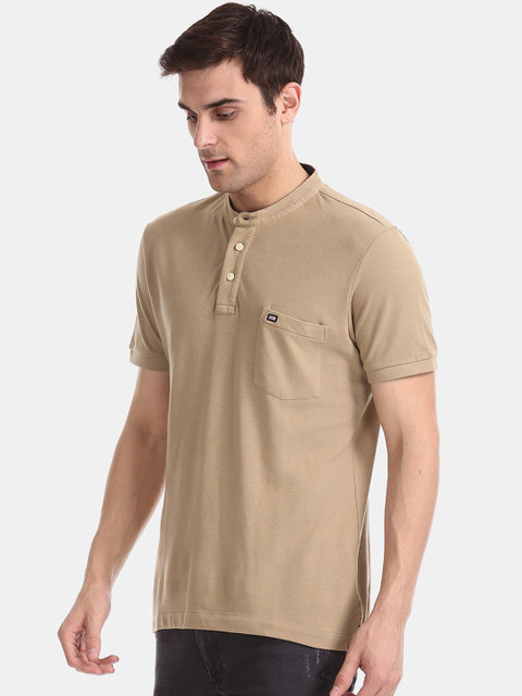 

Arrow Sport Men Beige Solid Polo Collar T-shirt