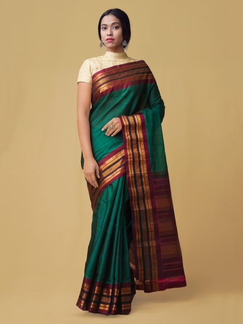 

Unnati Silks Green Solid Pure Gadwal Sico Saree