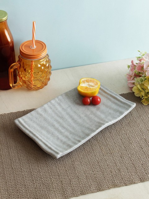 

HomeTown Gold-Toned Buddha On Stand Showpiece, Grey