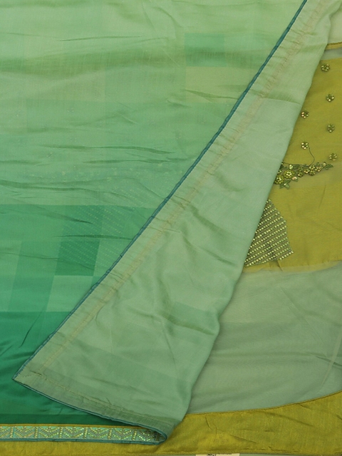 

Pothys Green Checked Poly Georgette Saree