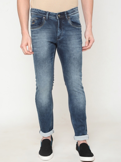

Oxemberg Men Blue Slim Fit Mid-Rise Low Distress Stretchable Jeans