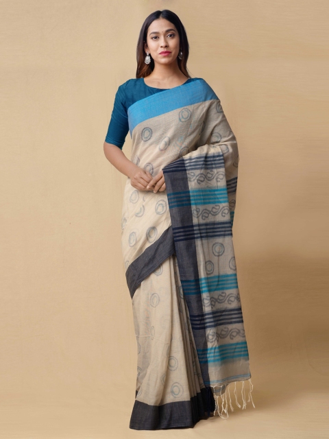 

Unnati Silks Beige & Blue Pure Cotton Woven Design Ikat Saree