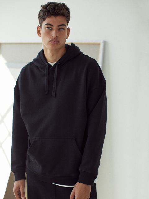 

H&M Men Black Solid Cotton Hoodie