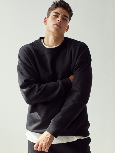 

H&M Men Black Solid Cotton Sweatshirt