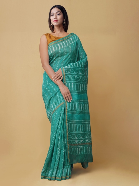 

Unnati Silks Green Silk Cotton Printed Chanderi Saree