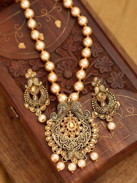 

ANIKAS CREATION Gold-Plated Cream-Colored & Brown Stone-Studded & Pearl-Beaded Antique Jewellery Set