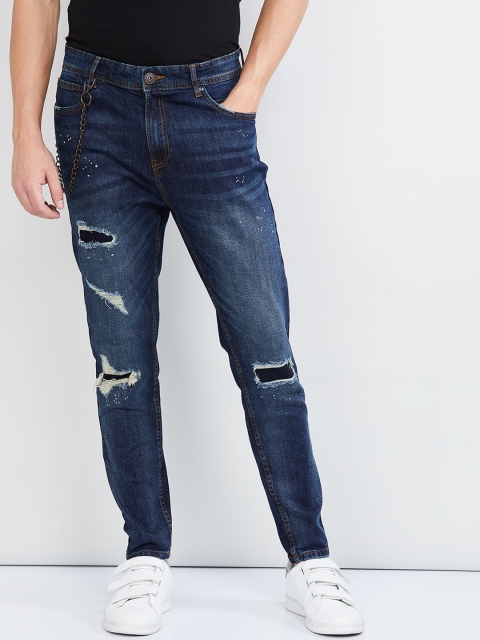 

max Men Navy Blue Skinny Fit Mid-Rise Mildly Distressed Ripped Jeans